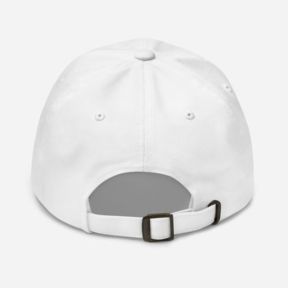 White baseball cap with antique buckle on back against a white back ground.